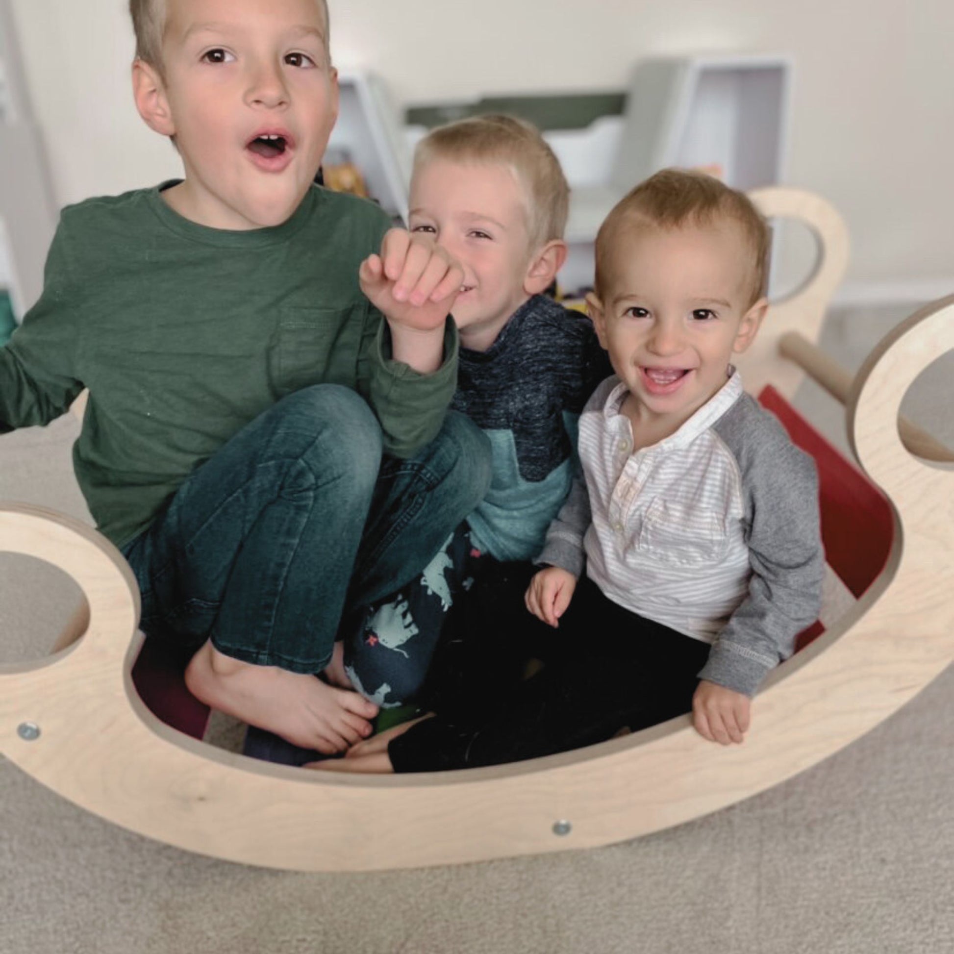 Kids rocking on a climber arch